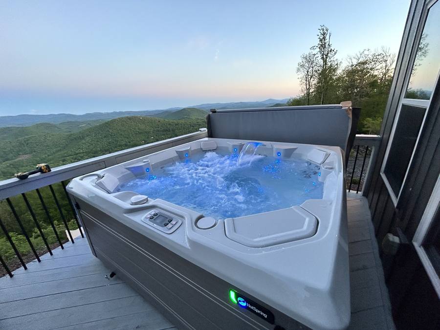 Hot tub on a deck overlooking the Appalachian ridgelines in the North Carolina High Country